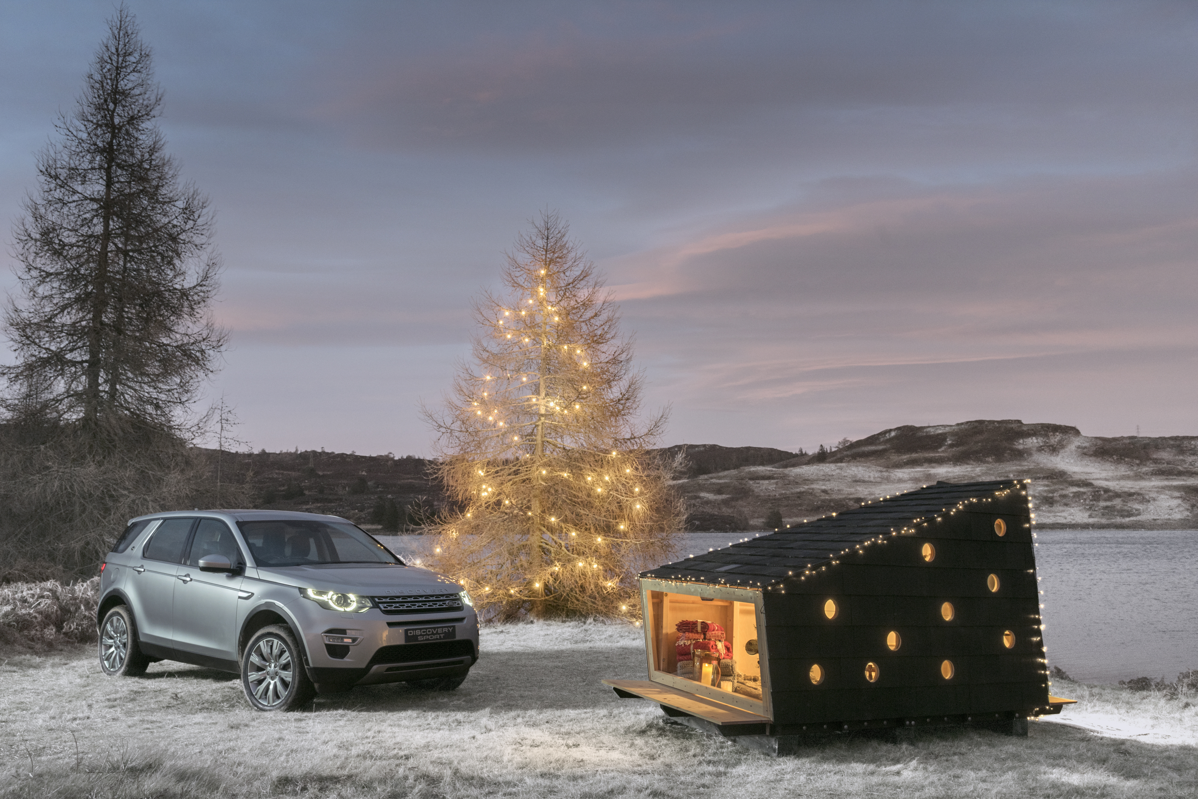 Wilderness Cabin built from parts that fit in the back of a Discovery Sport